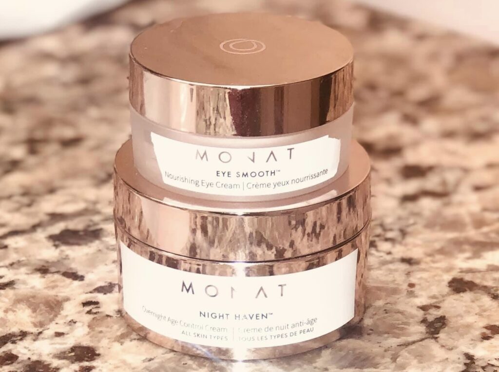 2 Monat Skin Care Products on a marble counter. 